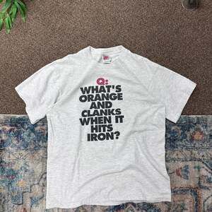 Vintage 80s Nike Orange Iron Basketball Clanks Graphic T-Shirt